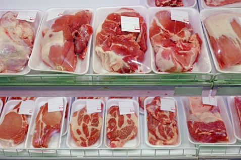 Packaged meat  on supermarket shelves